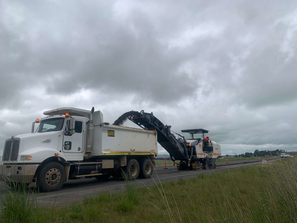 truck and paving machinery